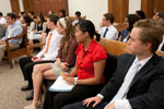 Thumbnail for Interns listening to a speaker